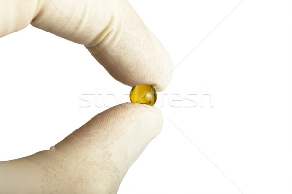 Jaune capsule doigts patient photo [[stock_photo]] © restyler