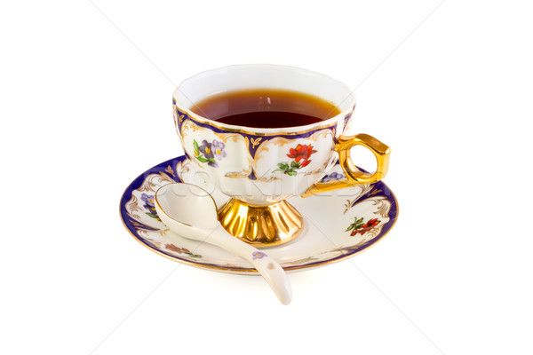 Copo chá branco beber ouro Foto stock © reticent