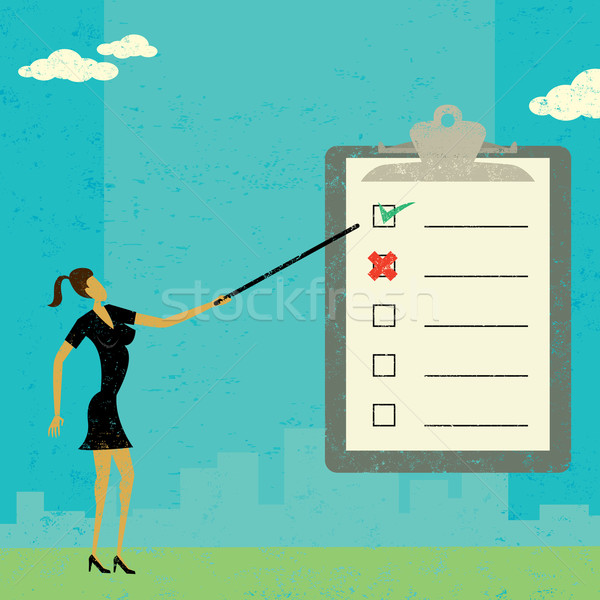 Examining a checklist Stock photo © retrostar