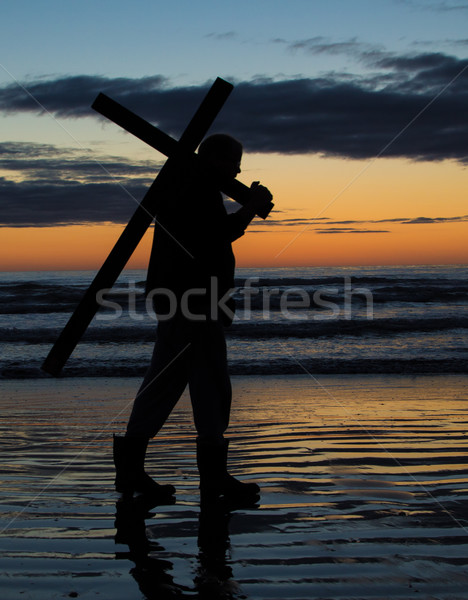 Cross uomo spiaggia acqua dio onde Foto d'archivio © rghenry