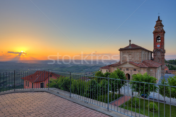 Church and hills of Langhe at sunset. Stock photo © rglinsky77