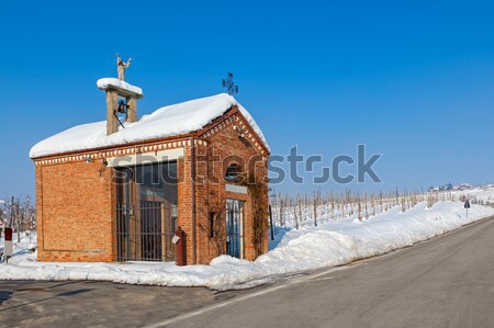 Roadside chapel and snowy vineyards. Piedmont, Italy. Stock photo © rglinsky77