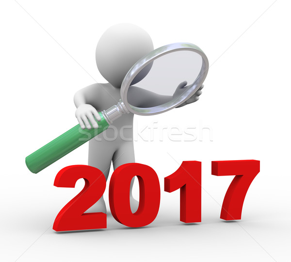 3d man looking at word 2017 with magnifier Stock photo © ribah