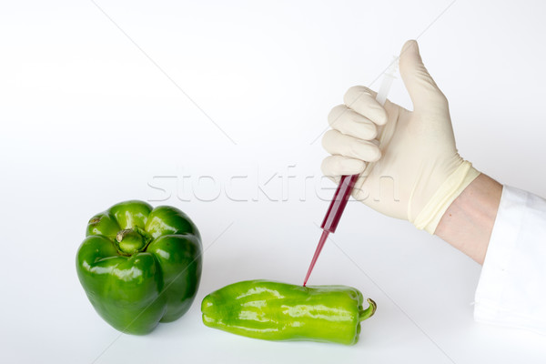 Stock photo: Inflating green peppers