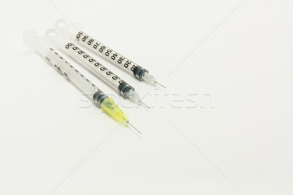 Three disposable syringes   Stock photo © robinsonthomas