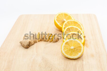 Сток-фото: имбирь · лимона · Ломтики · разделочная · доска