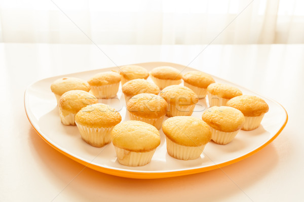 [[stock_photo]]: Savoureux · jaune · muffins · blanche · plaque · table