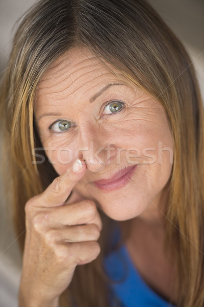 Confident smiling senior woman portrait Stock photo © roboriginal