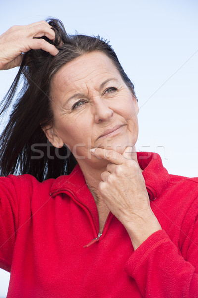 Stressed thoughtful woman scratching head Stock photo © roboriginal