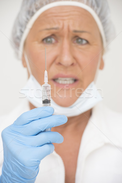 Médicaux infirmière injection vaccination portrait Homme Photo stock © roboriginal