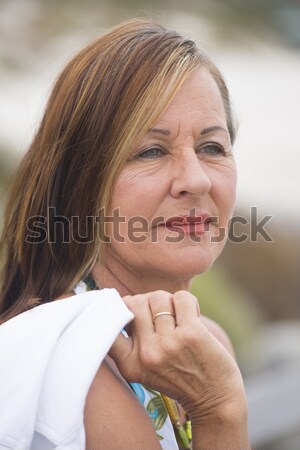 Concerned mature woman outdoor Stock photo © roboriginal