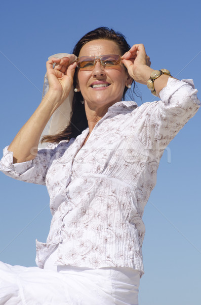 Retrato mulher madura óculos de sol belo Foto stock © roboriginal