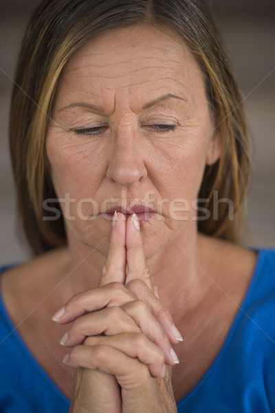 Stock photo: Praying woman hopeful thoughtful closed eyes