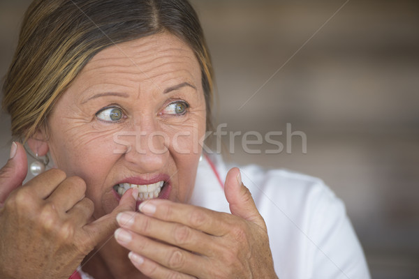 Mujer doloroso dolor de muelas retrato atractivo mujer madura Foto stock © roboriginal