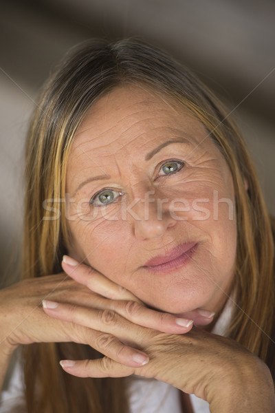 Confident elegant happy mature woman Stock photo © roboriginal