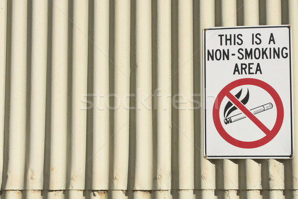 Danger no smoking area sign at building Stock photo © roboriginal