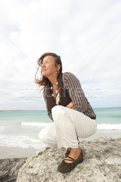 Mature woman ocean background Stock photo © roboriginal