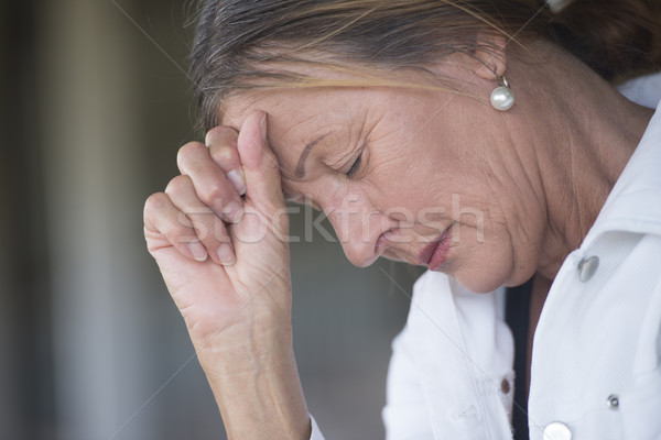 Lonely depressed mature woman portrait Stock photo © roboriginal
