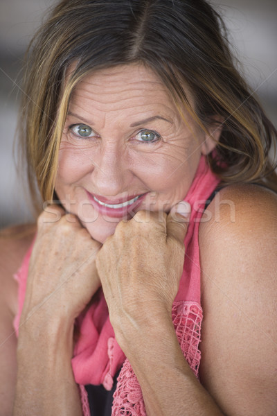 Nieśmiała atrakcyjny starsza kobieta portret przyjazny uśmiech Zdjęcia stock © roboriginal