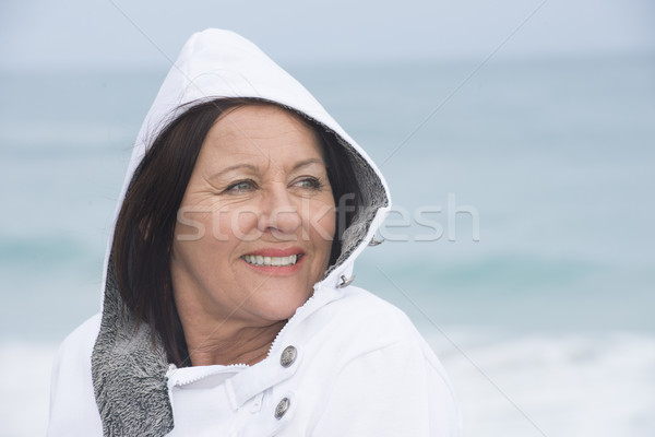 Stock photo: Mature Woman autumn portrait ocean