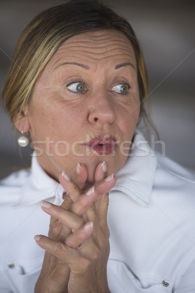 Surprised worried mature woman portrait Stock photo © roboriginal