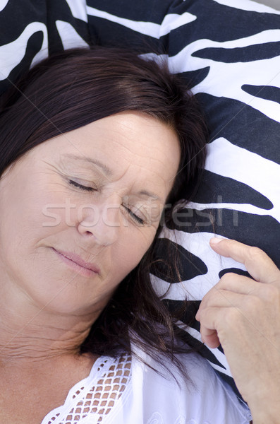 Stock photo: Sleeping relaxed happy mature woman