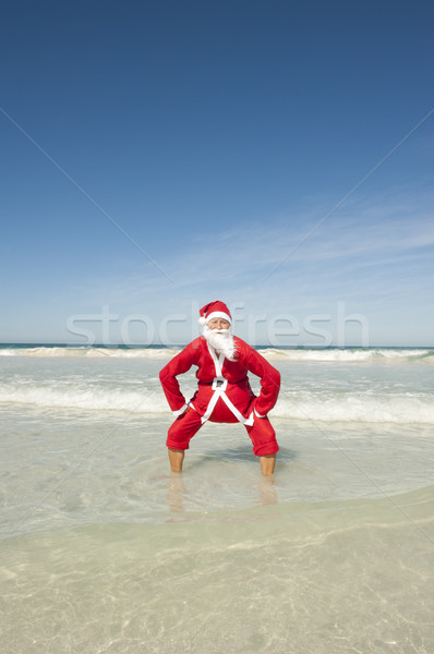 Happy Santa Clause at Ocean Holiday Stock photo © roboriginal