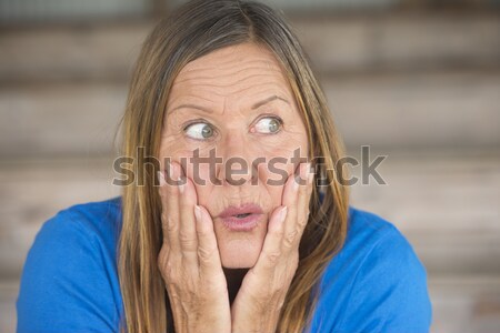 Shocked fearful woman portrait Stock photo © roboriginal