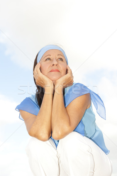 thoughtful middle aged woman outdoor Stock photo © roboriginal