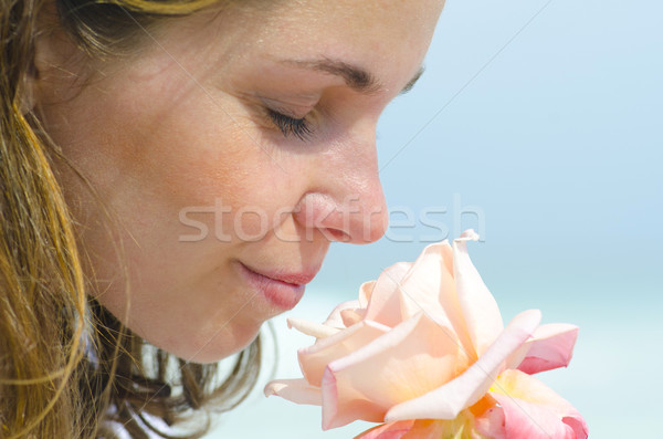 Joli jeune fille parfum fleur portrait [[stock_photo]] © roboriginal