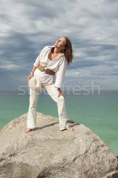 Attractive mature woman ocean background Stock photo © roboriginal