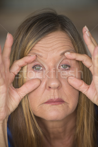 Tired stressed woman suffering headache Stock photo © roboriginal