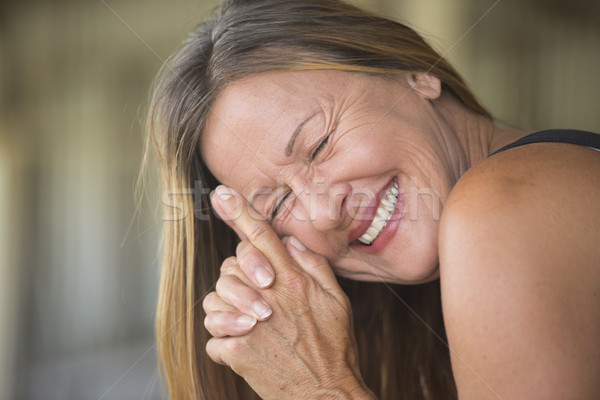 Joyful happy smiling mature woman portrait Stock photo © roboriginal