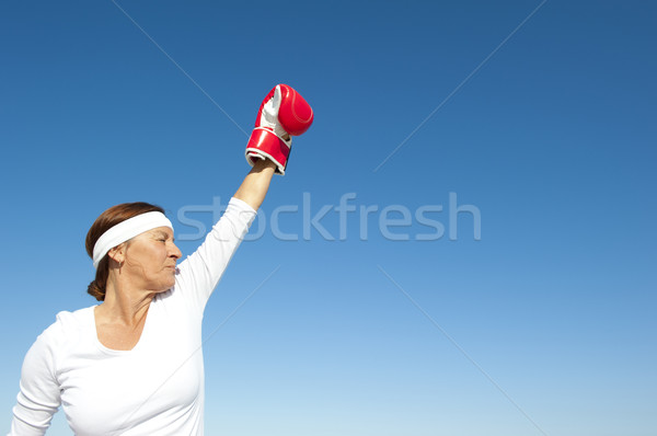 Actief senior vrouw hemel aantrekkelijk overwinning Stockfoto © roboriginal