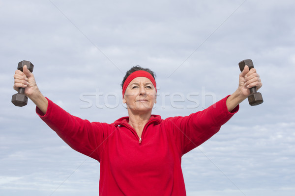 Confident Mature woman active retirement outdoor Stock photo © roboriginal