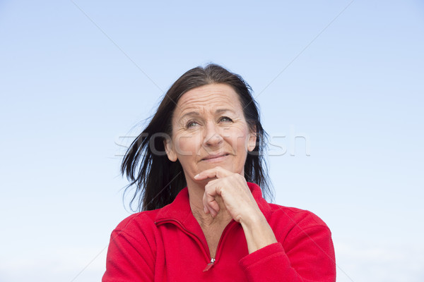 Stock photo: Thoughtful attractive mature woman