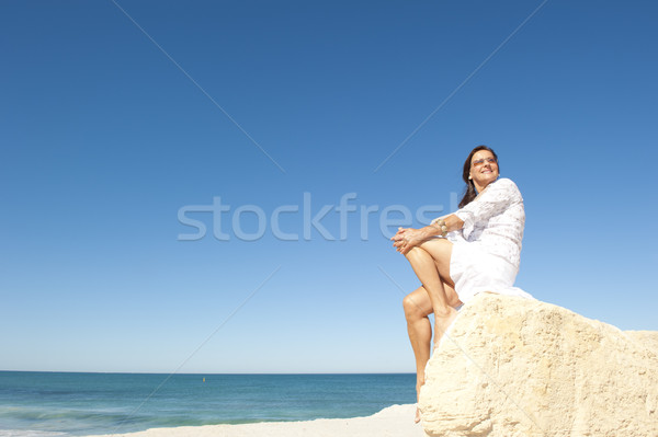 Middle aged woman ocean background Stock photo © roboriginal