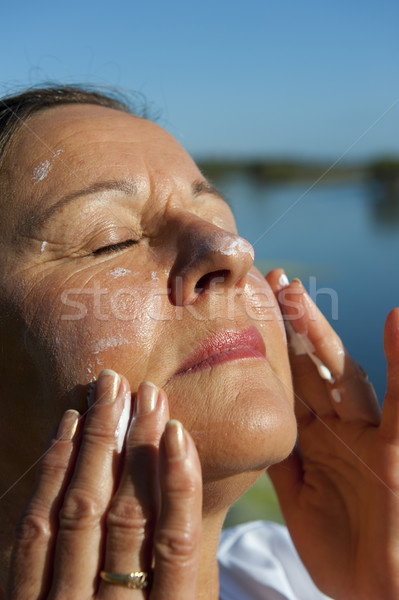 женщину Рак кожи защиту портрет привлекательный Сток-фото © roboriginal