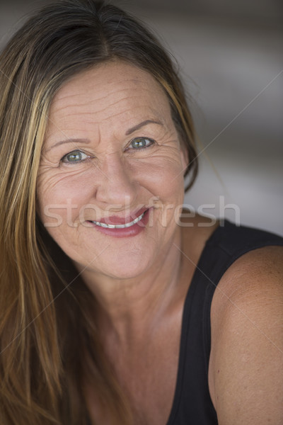 Confident relaxed mature woman portrait Stock photo © roboriginal