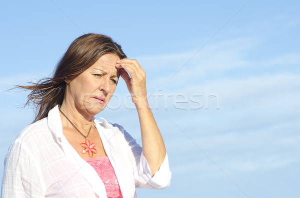 Thoughtful worried senior woman isolated Stock photo © roboriginal