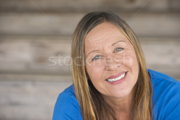 Happy laid back woman portrait Stock photo © roboriginal