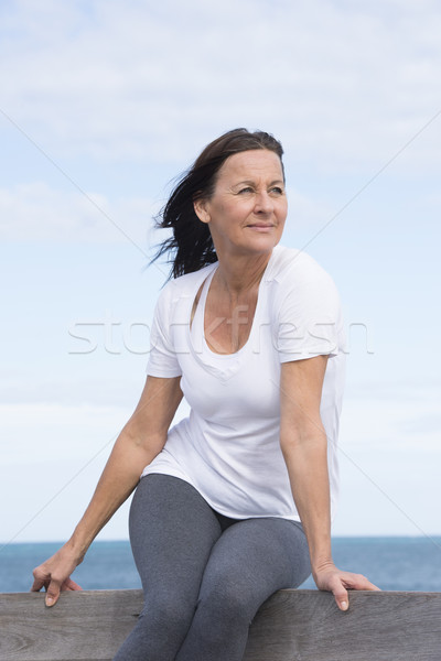 Relaxed sporty senior woman outdoor Stock photo © roboriginal