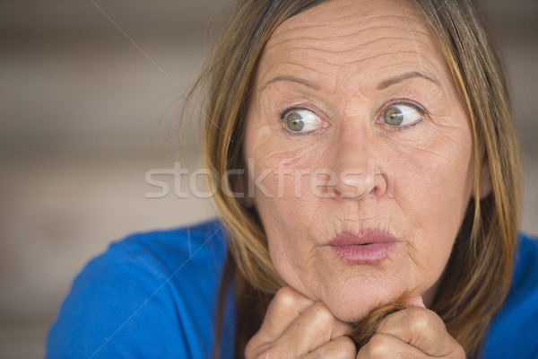 Surprised anxious woman portrait Stock photo © roboriginal