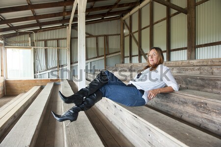 Relaxed Thoughtful woman outdoor sitting Stock photo © roboriginal