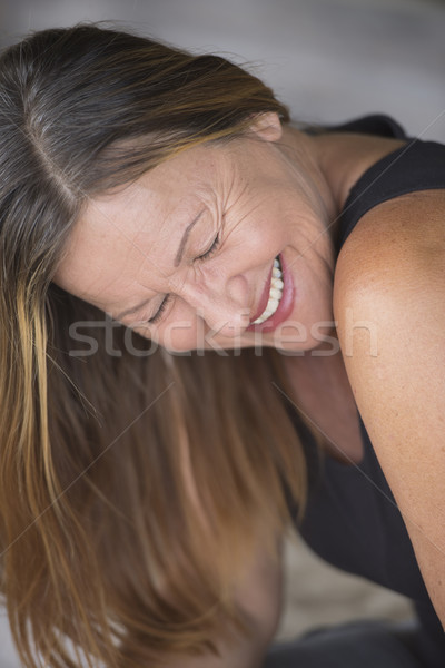 Joyful happy laughing mature woman portrait Stock photo © roboriginal