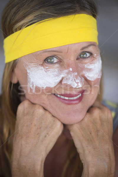 Stock photo: Skin care moisturiser confident mature woman