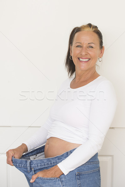 Glücklich reife Frau Ernährung Porträt passen Stock foto © roboriginal