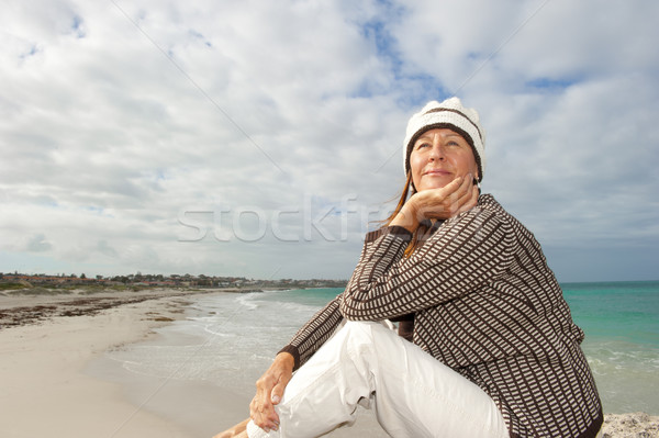 Natural mature woman ocean background Stock photo © roboriginal