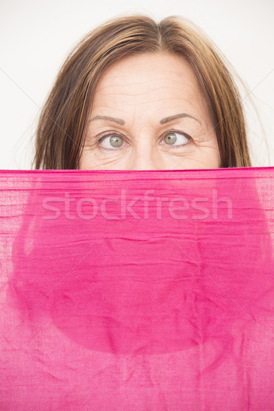 Woman behind cloth with squint look Stock photo © roboriginal