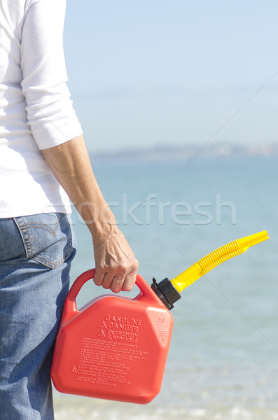 Hand halten Kraftstoff kann Person stehen Stock foto © roboriginal